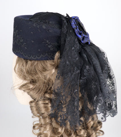 bustle hat in black and blue