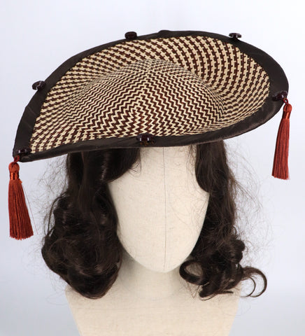 brown and cream fascinator with many tassels
